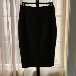 Knee height skirt.